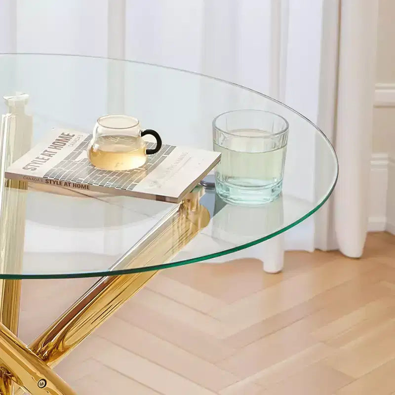 Stylish Golden Dining Table with Glass Top and Cross Legs